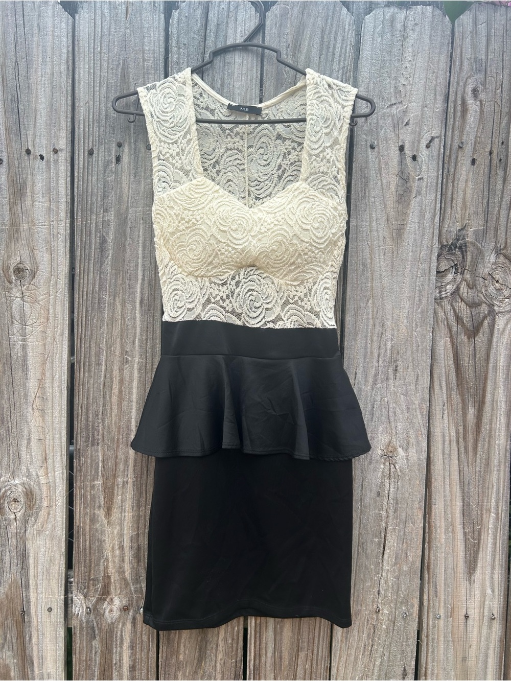 Lace Bodice Peplum Dress in Ivory and Black